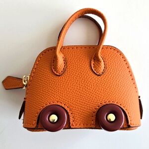 UNBRANDED Orange Bag on Wheels Bag Charm w/Mini Twilly *Ear Buds Case